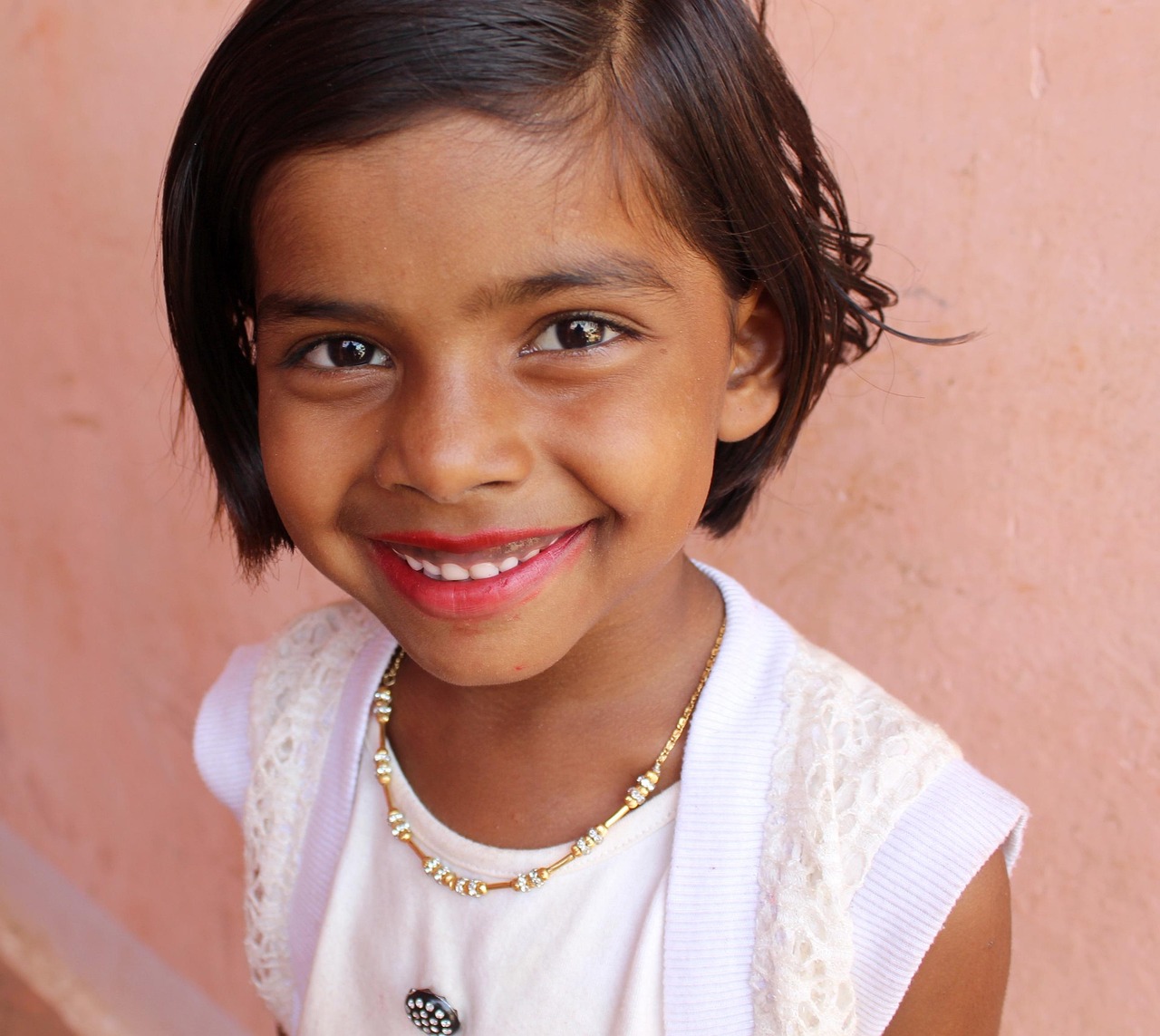 Child psychiatrist in Mumbai - happy smiling Indian child representing child mental health services